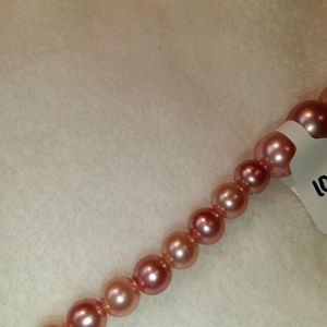 Handmade beaded wire bracelet.